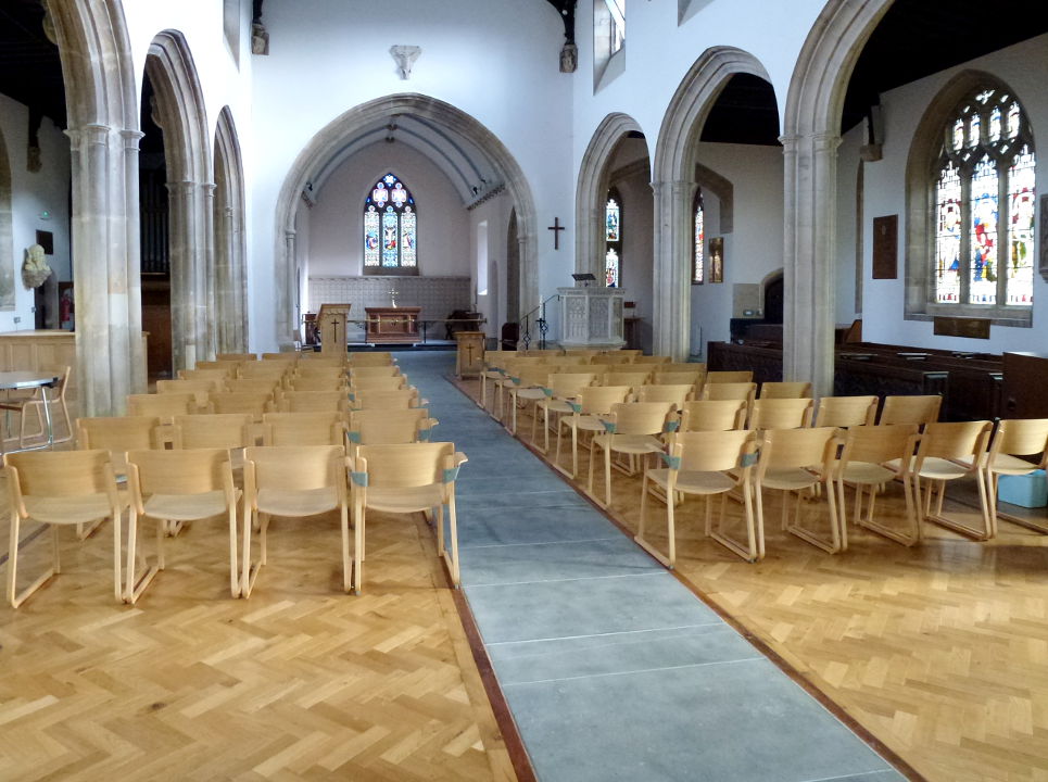 Picture of the interior, looking down the nave to the chancel